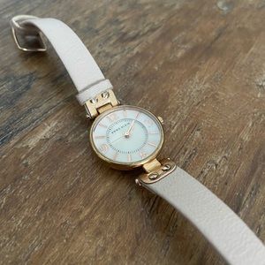 Nude, thin band watch